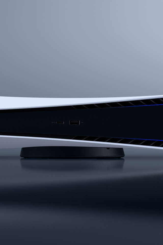 Игровая консоль Playstation 5 на сером фоне