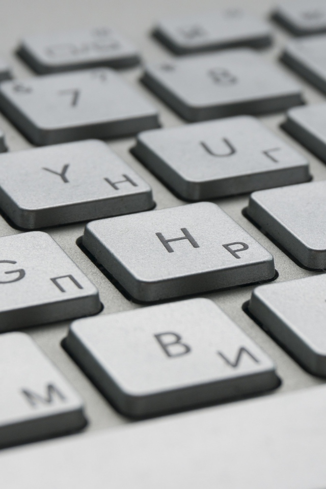 Белая клавиатура ноутбука крупным планом 