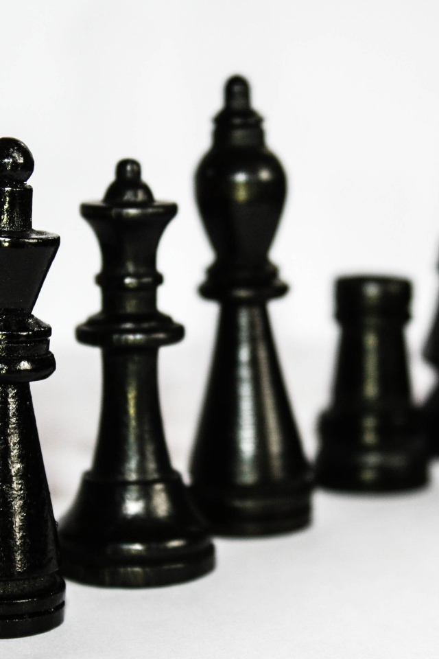 Black wooden chess on the table
