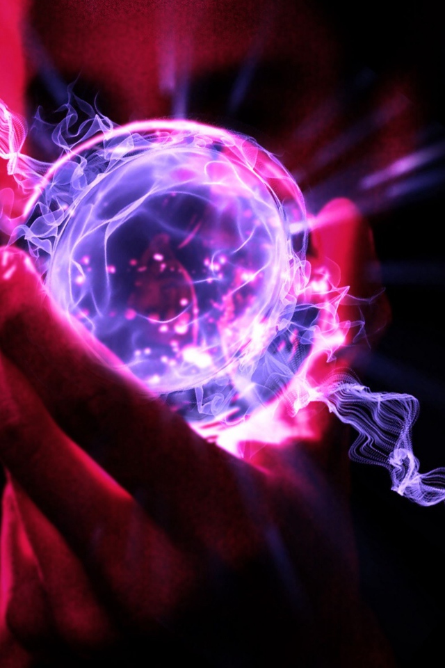 Neon fantastic ball in the hand