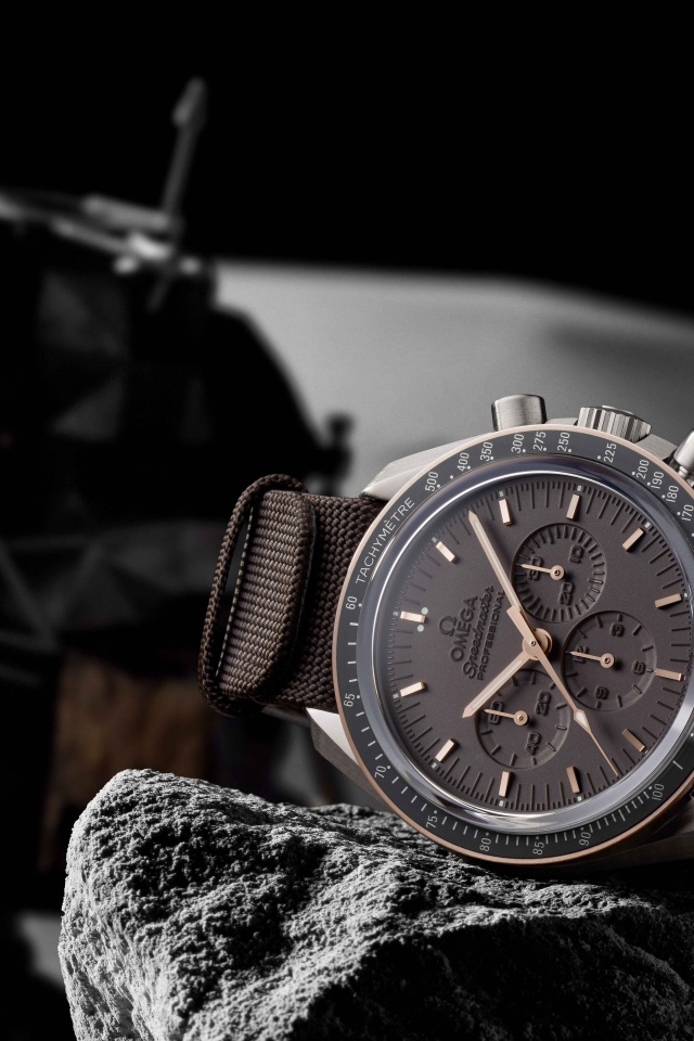 Omega NASA men's watch lies on a stone