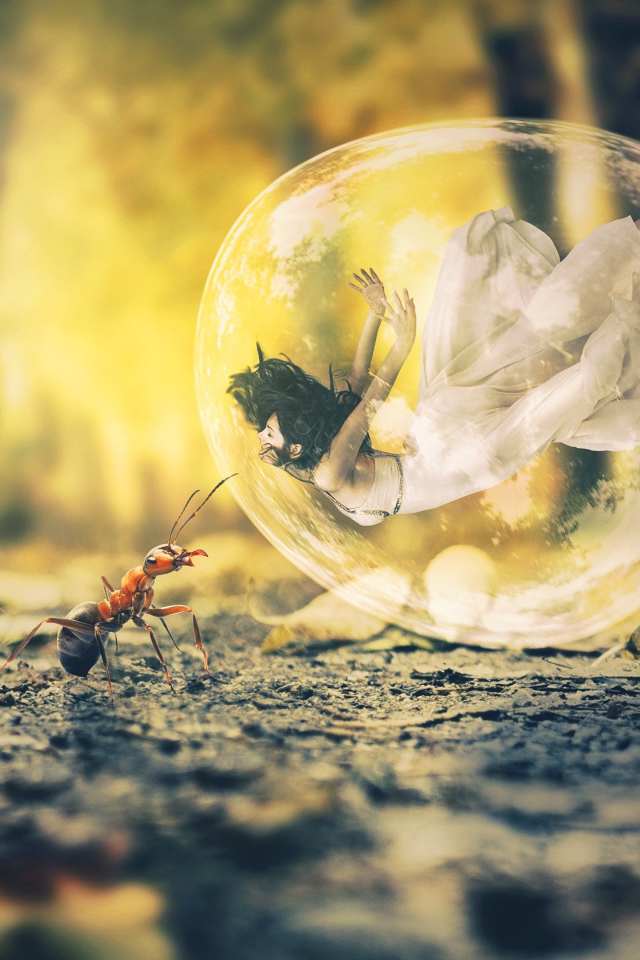 Girl in a bubble on the pavement with ants