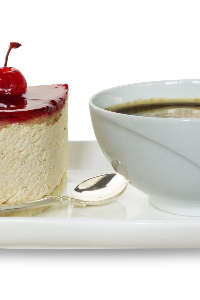 Пирожное с чашкой кофе на белом фоне