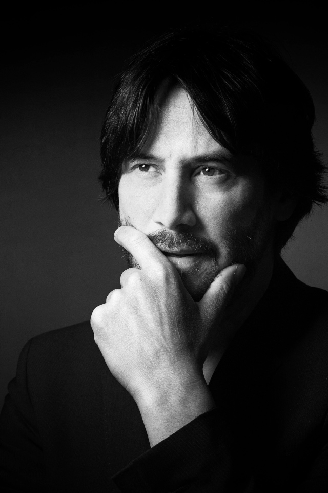 Стильный мужчина, канадский актер Киану Ривз  в костюме