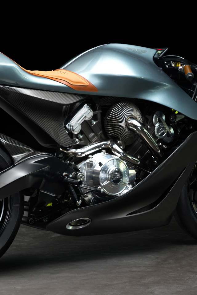 Серый мотоцикл Aston Martin Brough Superior AMB-001 EICMA 2019 года на черном фоне