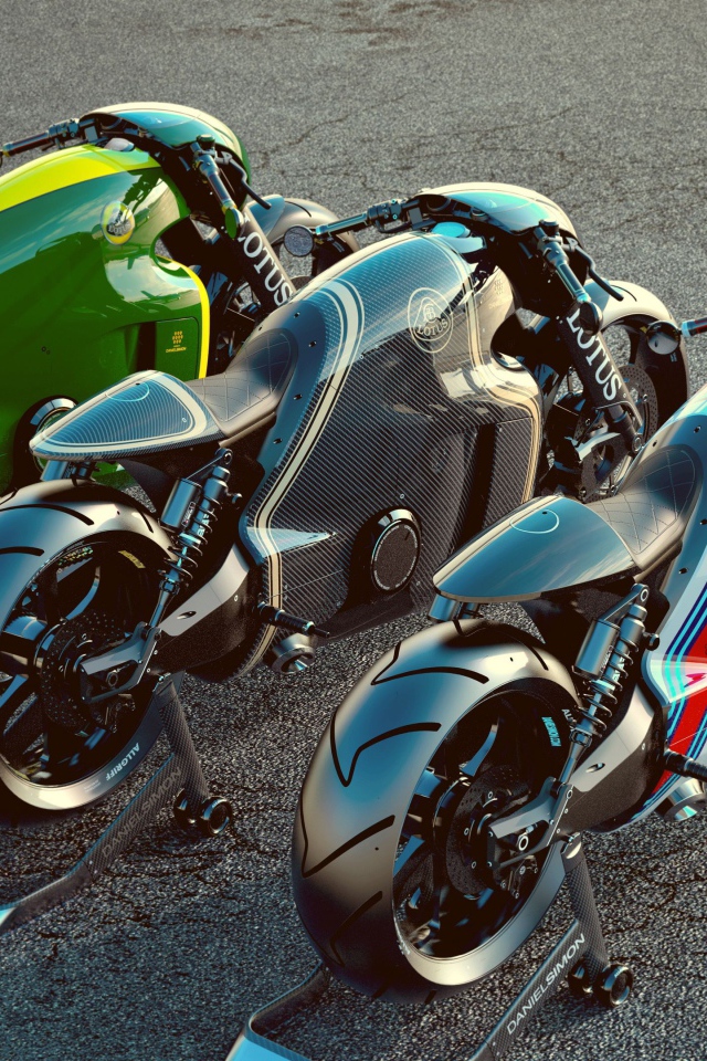 Три мотоцикла Lotus C01 на асфальте 