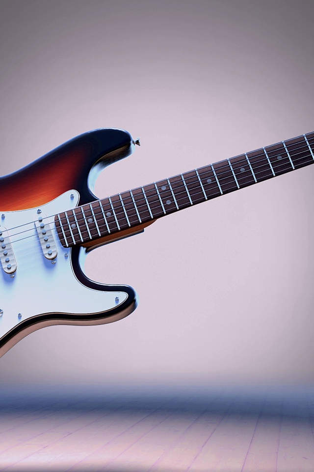 Electric guitar soars in the air on a gray background