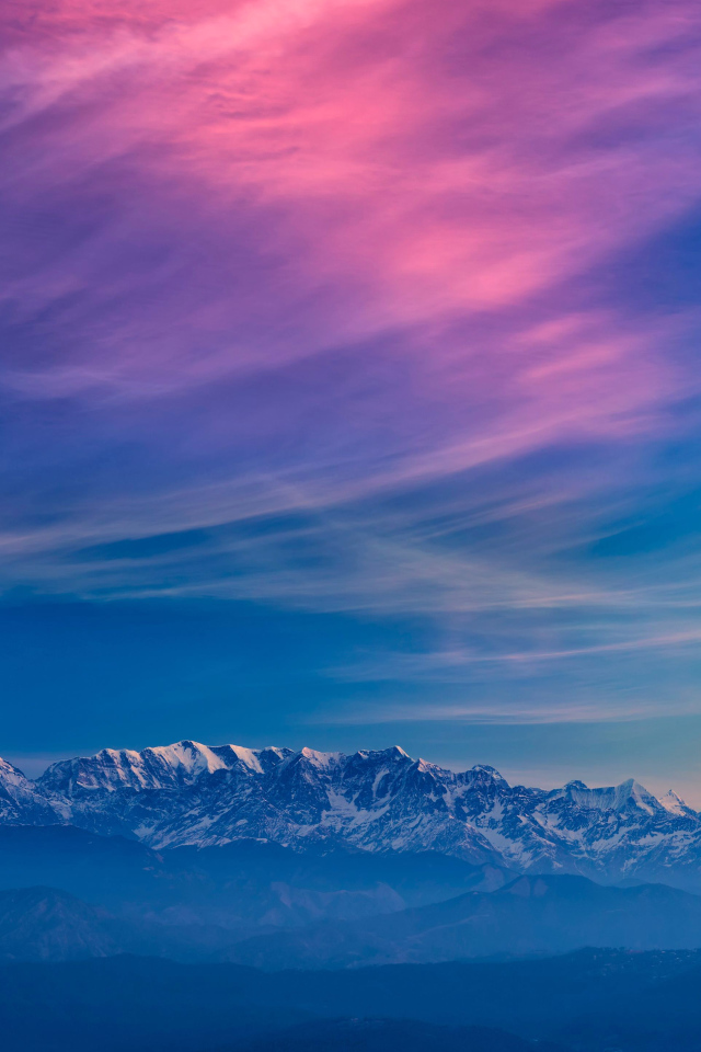 Beautiful sky over snow-capped mountains