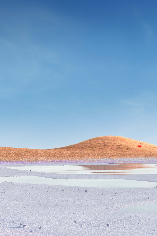 Высохшее озеро на фоне голубого неба