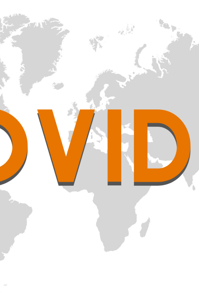 Большая надпись COVID 19 на фоне карты 