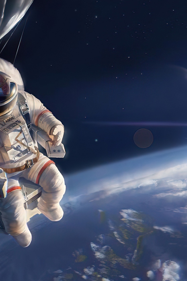 Астронавт вышел в открытый космос над землей 