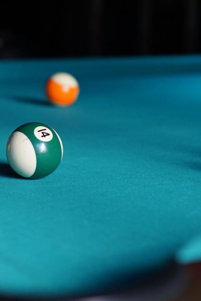 Blue billiard table with balls