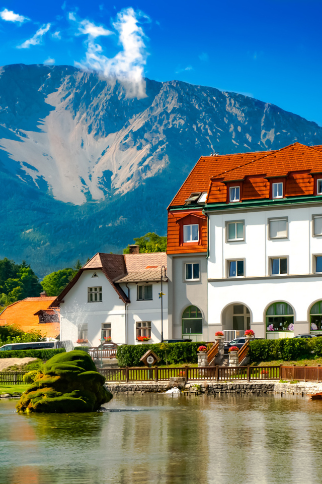 Big beautiful white house at the foot of the mountain, Austria