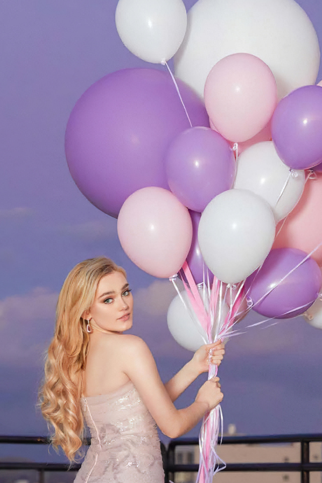 American actress Meg Donnelly with balloons