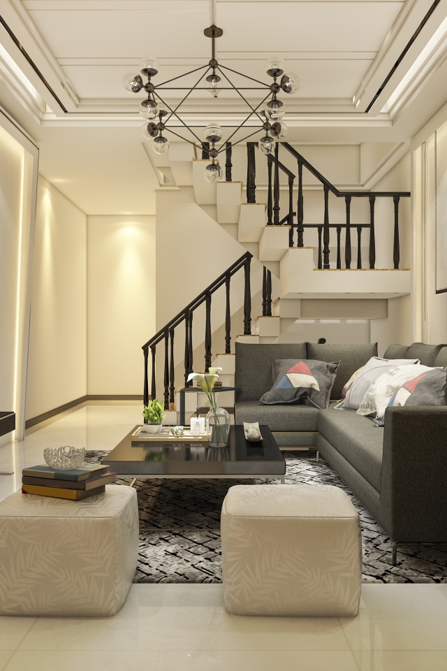 Красивая гостиная комната с большим телевизором и лестницей 