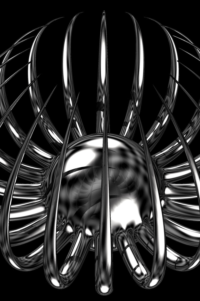 Серебряный цветок с острыми лепестками на черном фоне