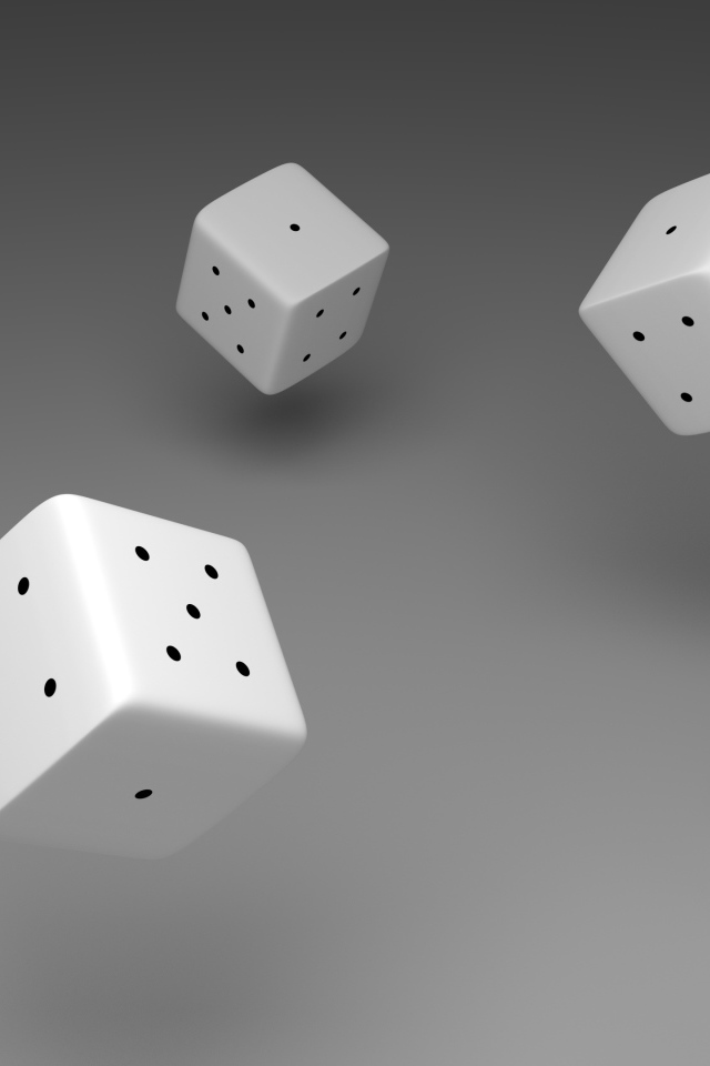 Белые игральные кости в воздухе на сером фоне