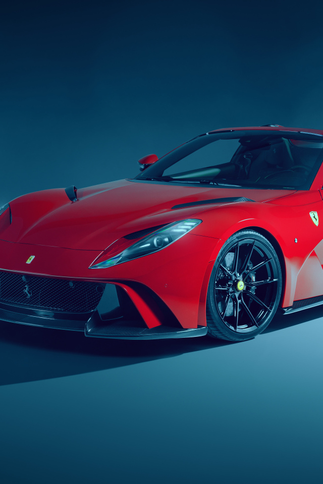 Красный кабриолет Novitec Ferrari 812 GTS N-Largo 2021 года на сером фоне