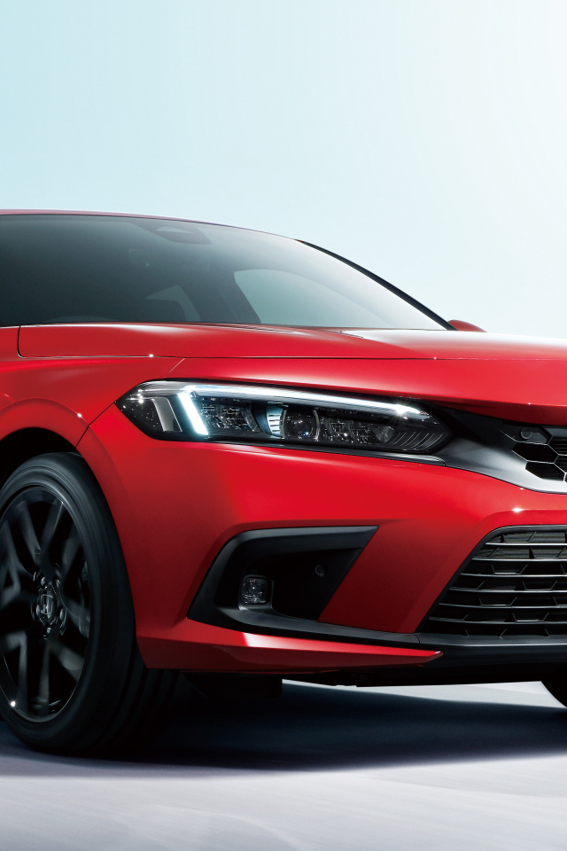 Красный автомобиль Honda Civic Hatchback 2021 года