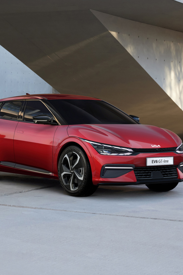 Красный автомобиль Kia EV6 GT Line 2021 года