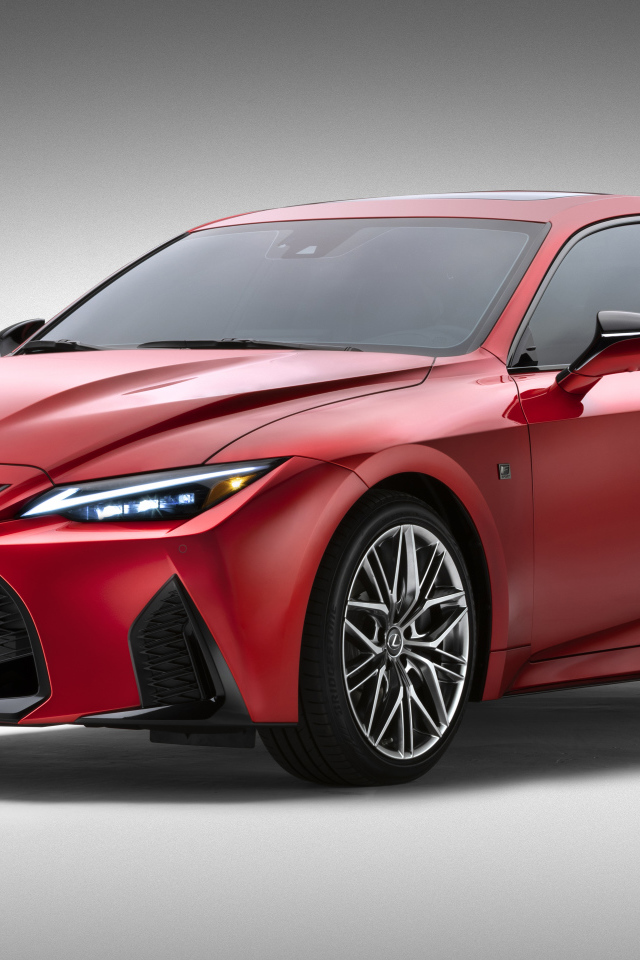 Красный Lexus IS 500 F SPORT Performance, 2022 года на сером фоне