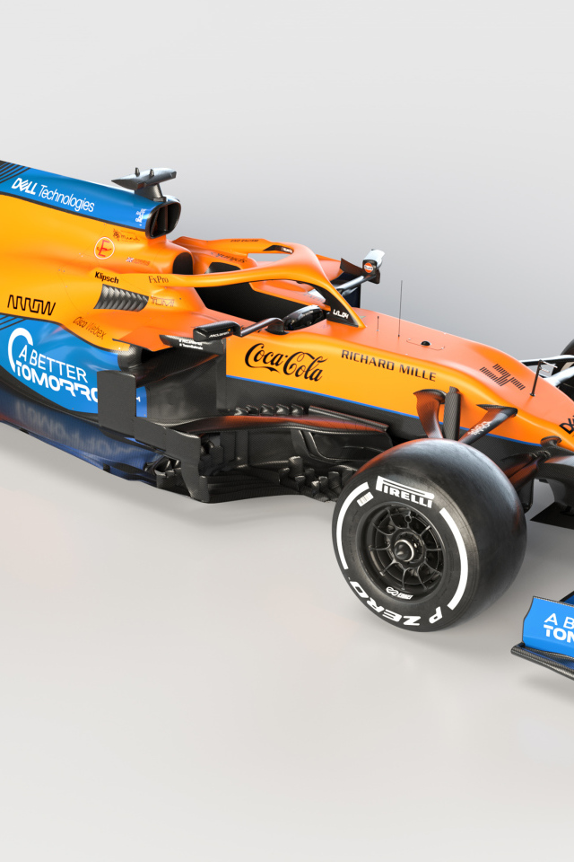 Быстрый гоночный автомобиль McLaren MCL35M 2021 года на сером фоне