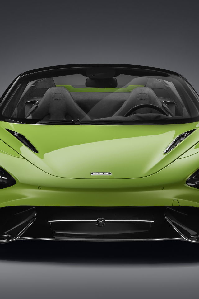 Зеленый McLaren 765LT Spider 2022 года а сером фоне 