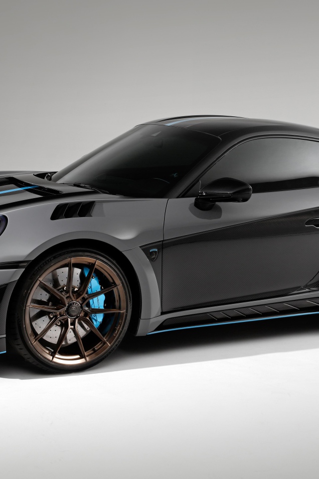 Серый гоночный автомобиль Porsche 911 Turbo S Stinger GTR 3 2021 года