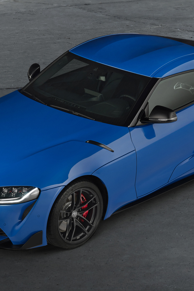 Синий автомобиль Toyota GR Supra, 2021 года вид сверху