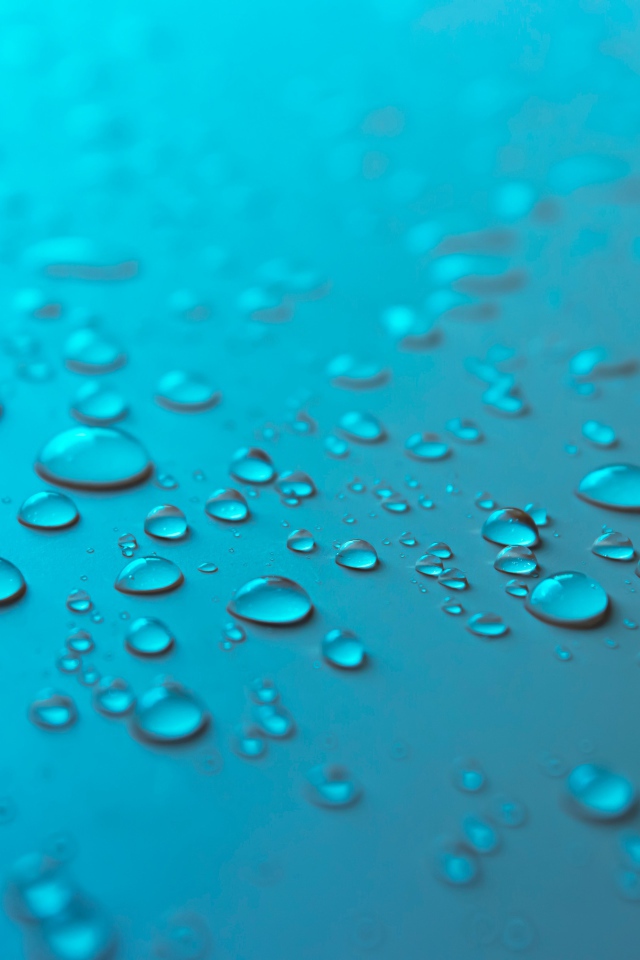 Голубой фон с каплями воды на поверхности