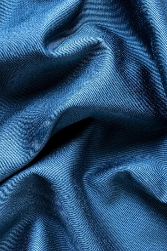 Кусок синей ткани крупным планом