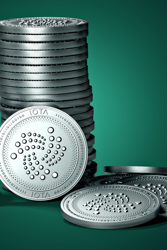 IOTA coins on green background