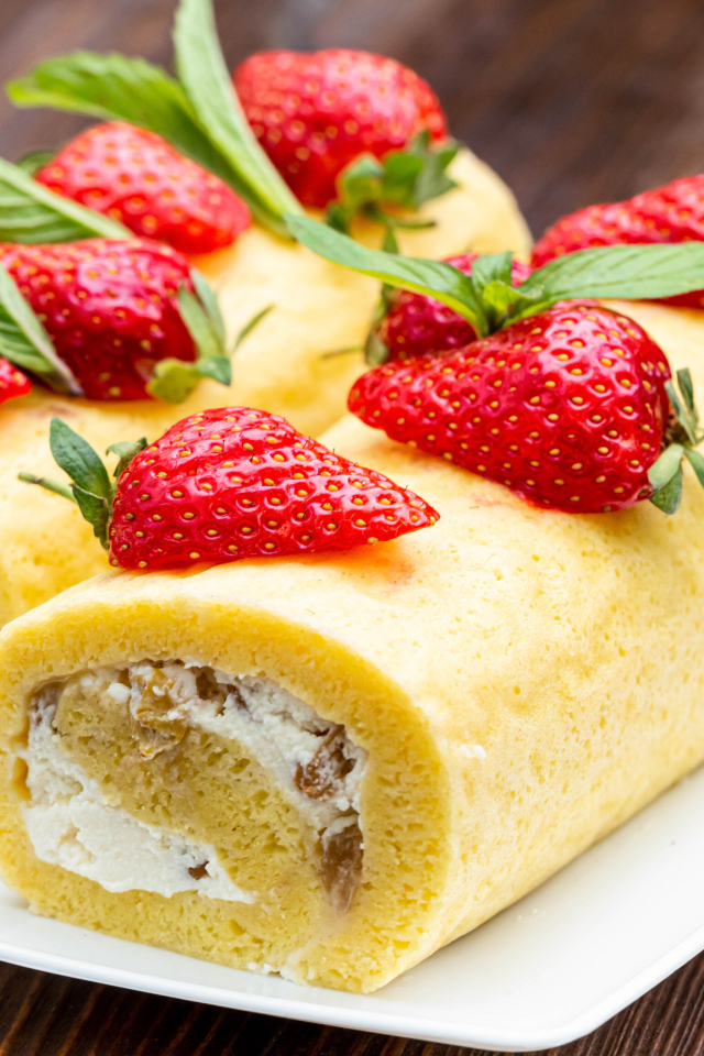 Appetizing sweet roll with strawberries