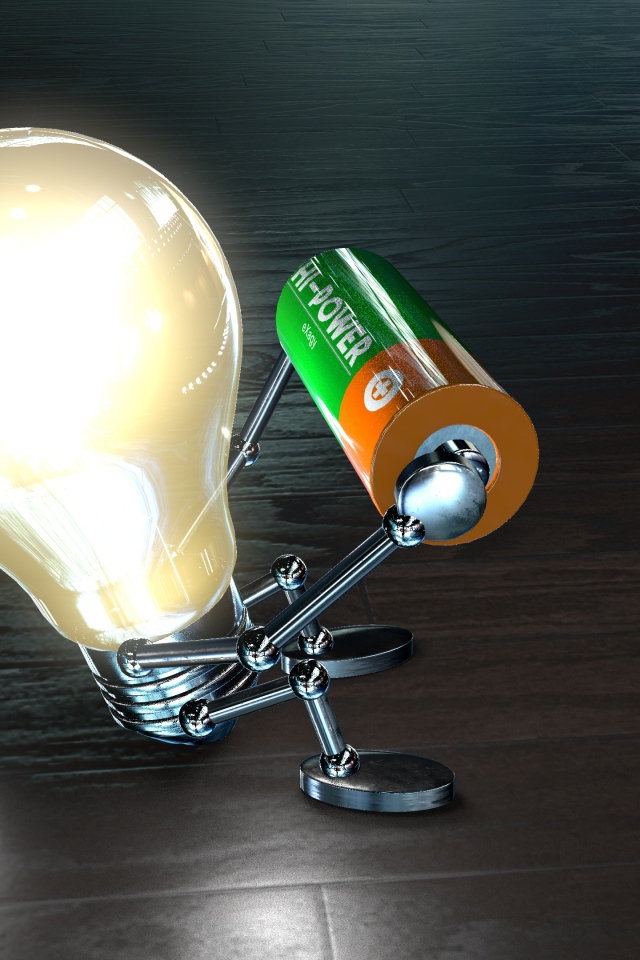 Лампочка с батарейкой в руках на полу