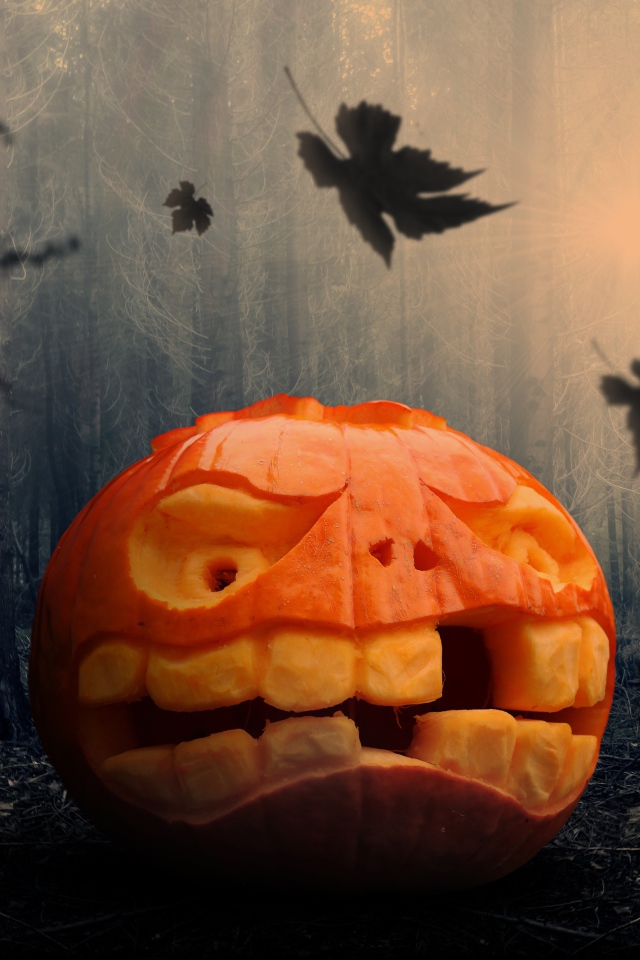 Гримаса из тыквы на праздник Хэллоуин