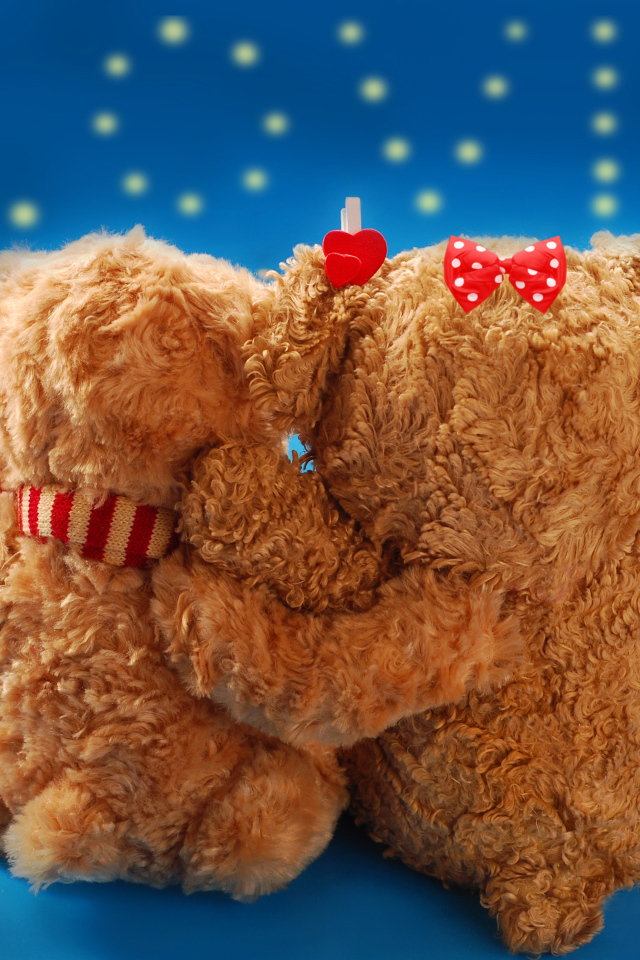 Два влюбленных медведя на голубом фоне на День влюбленных