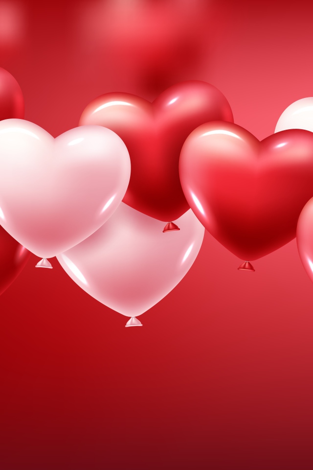 Белые и красные шарики в форме сердца на красном фоне