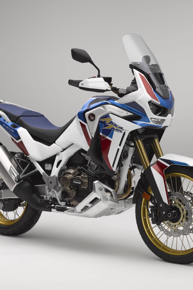 Мотоцикл Honda CRF1100L Africa Twin, 2021 года на сером фоне