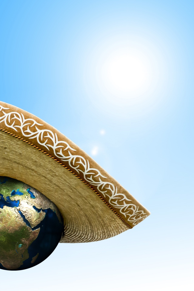 Планета земля в сомбреро на голубом фоне