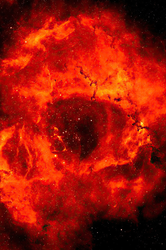 Красная туманность в космосе на черном фоне