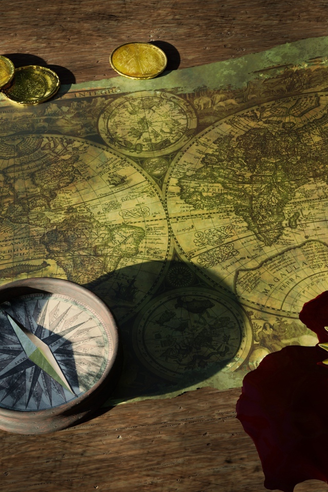 Старая карта с компасом и монетами