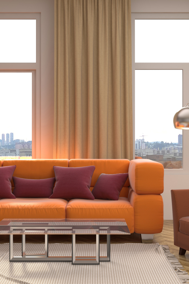 Большой оранжевый диван с подушками у окна 