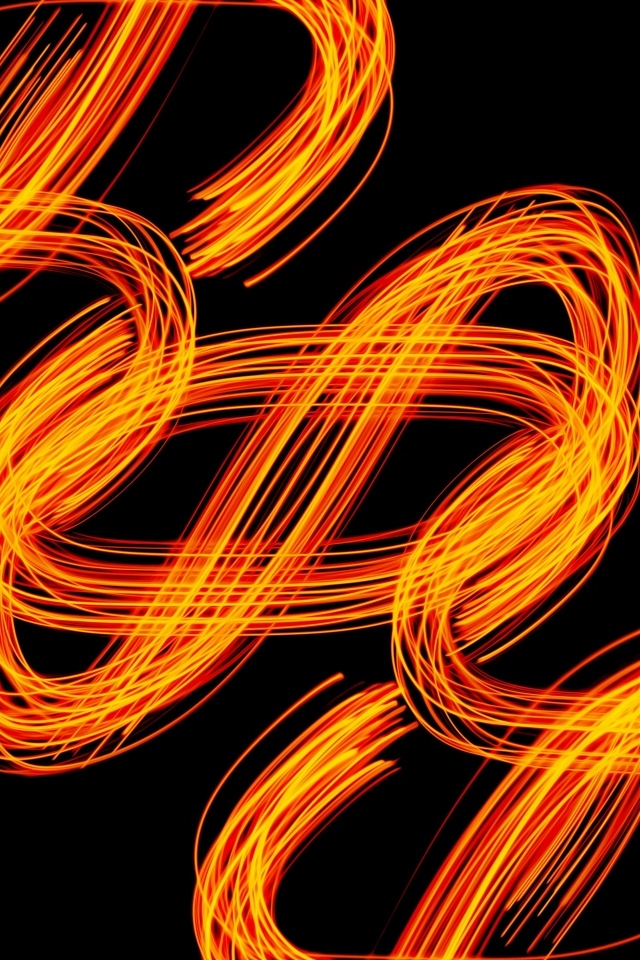Огненные завитки на черном фоне