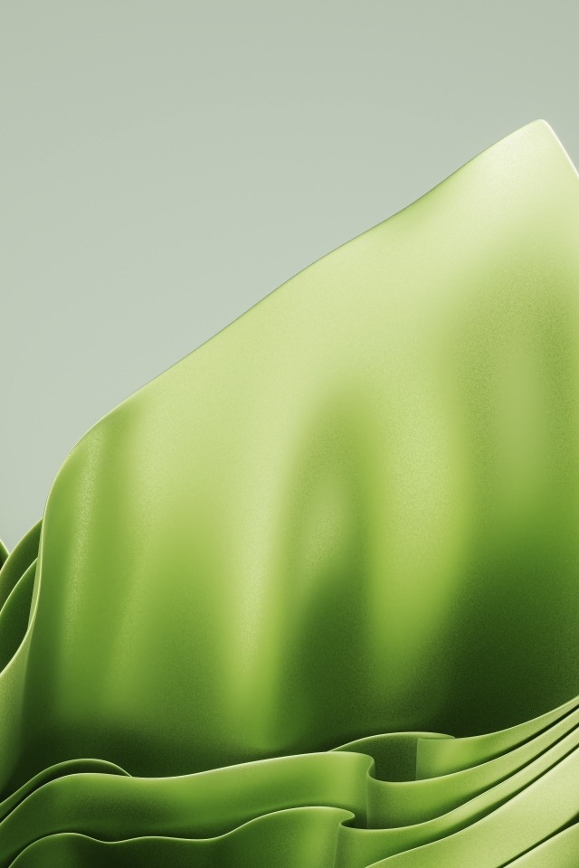 Зеленые абстрактные листья на сером фоне