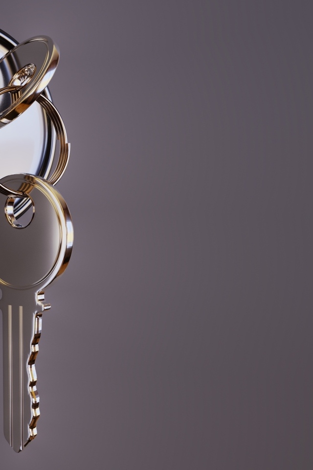 Ключ в замке на сером фоне