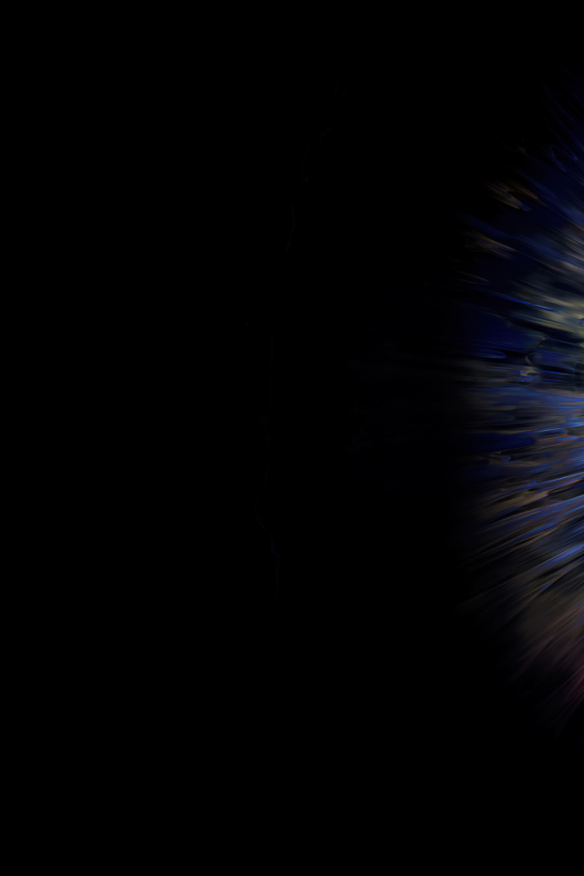 Разноцветная вспышка на черном фоне