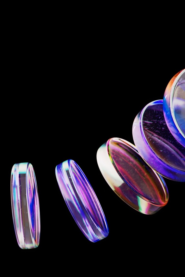 Неоновые стеклянные круги на черном фоне