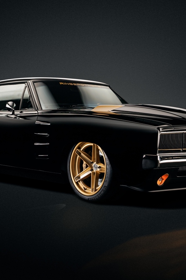 Черный ретро автомобиль Dodge Charger Tusk 1969 года