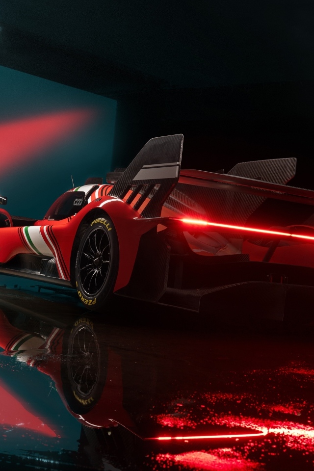 Красный спортивный автомобиль Ferrari 499P Modificata готовится к гонке