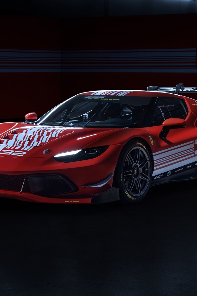 Красный быстрый автомобиль Ferrari 296 Challenge 2023 года